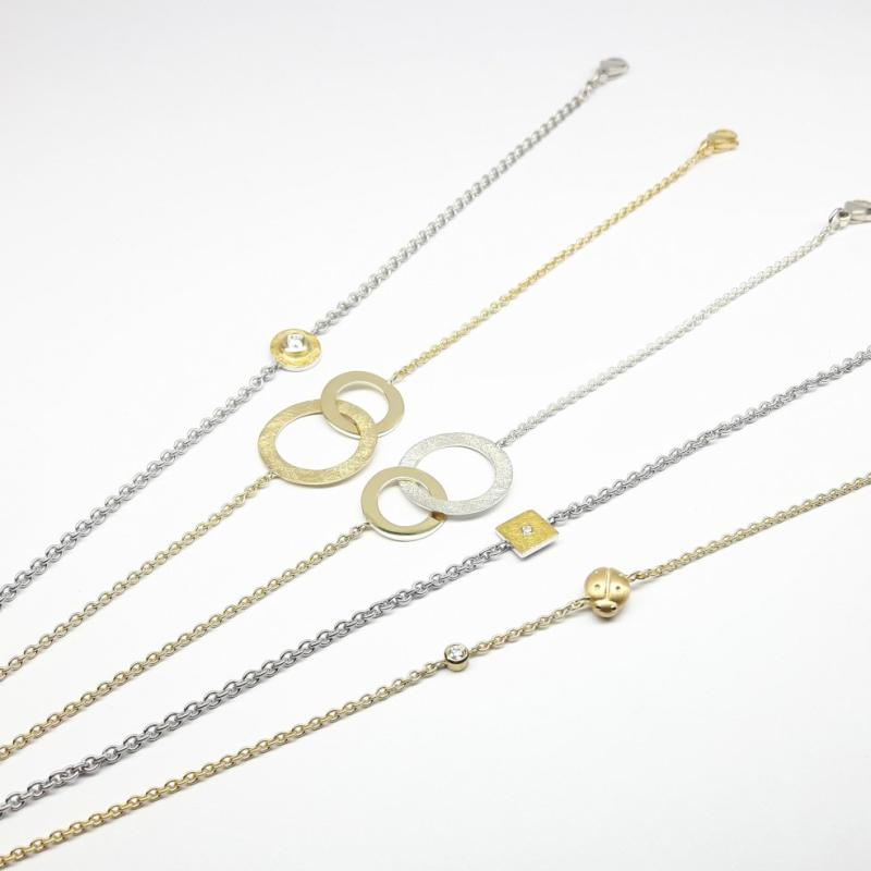 Bracelet en or jaune 18kt et argent 925/-.